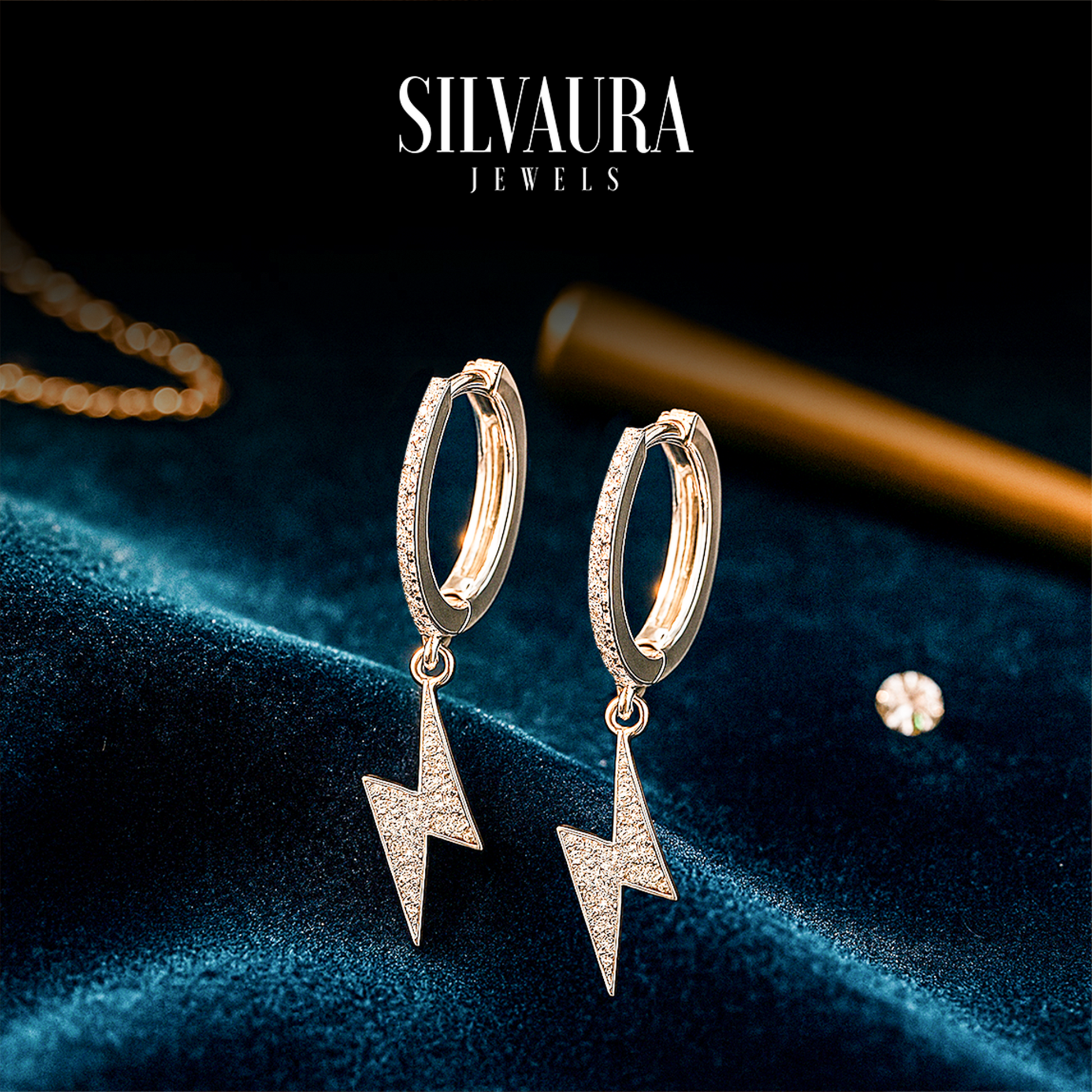 SILVAURA JEWELS sterling silver lightning bolt hoop earrings with pave crystals on velvet display